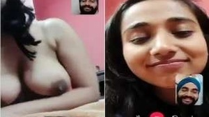 Beautiful Indian woman reveals her breasts to her partner via video
