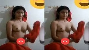 A gorgeous girl flaunts her breasts and vagina on a video call
