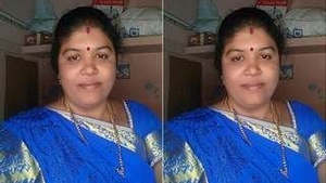 Busty Indian wife bares her breasts and pussy on camera