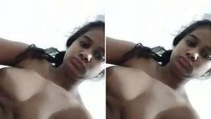 A gorgeous Sri Lankan woman flaunts her ample breasts