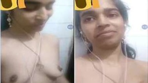 Indian babe reveals her XXX-rated breasts and pleasures herself with her hand