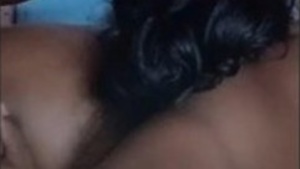 Passionate couple shares a kiss and performs oral sex