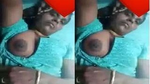 Older aunt reveals her large breasts during a video chat