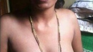 Desi bhabi's cute face and big tits on display in lw video