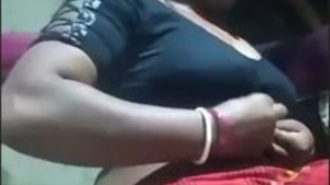 Aroused Bengali Boudi pleasures herself with fingers in village setting