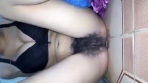 Tamil girl with hairy cunt masturbates with fingers