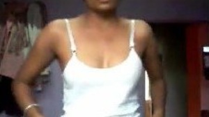 Desi Indian girl undresses for a selfie in her room