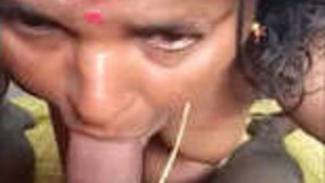 Mature Indian woman gives a sensual blowjob in a video