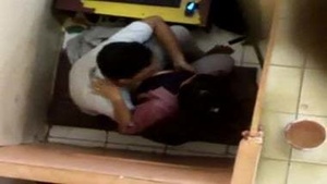 Hidden camera captures hot Indian girlfriend's wild cyber cafe sex