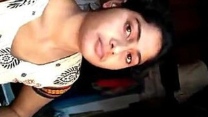 Watch an Indian girl show off her XXX muff and have solo sex in her room