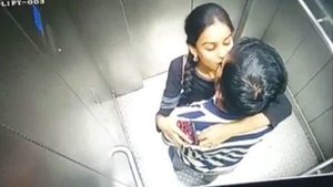 Spy on a hot couple in the lift as they get frisky and dirty