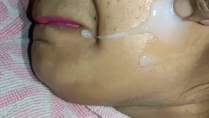 Facial Finish: Watch as a woman gets covered in cum
