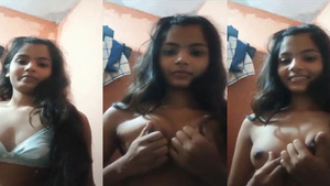 A stunning country girl flaunts her natural breasts on camera