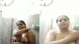Desi wife gets naughty in the shower while having video call