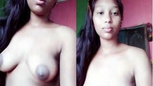 Desi Budi flaunts her breasts and vagina in a seductive manner