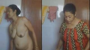 Watch as a stunning Indian wife gets naked and scrubs her body