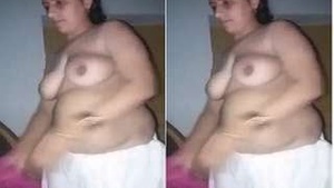 Indian bhabhi flaunts her breasts and vagina