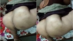 Desi wife with a big butt gives her husband a handjob
