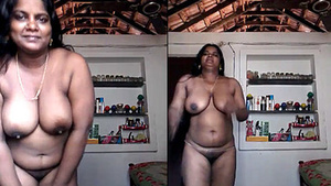 Attractive Tamil woman flaunts her large breasts and intimate area