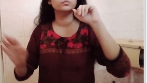 Desi bhabhi's solo bathroom strip and selfie video