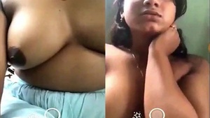 European babe flaunts her big tits on video call