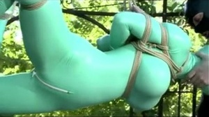 Outdoor latex bondage sex with a dirty babe