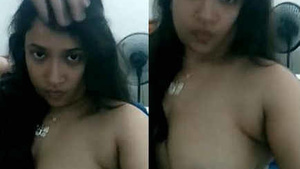 Adorable Indian girl flaunts her breasts in a steamy video