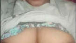Enjoy the view of a Tamil girl's cute boobs and pussy in this video