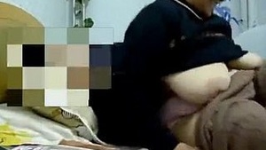 Chinese grandma enjoys steamy sex in amateur video