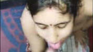 Desi bhabhi strips and receives cum on face in Hindi video