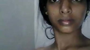 Tamil wife's selfie video showcasing her big boobs and shaved pussy