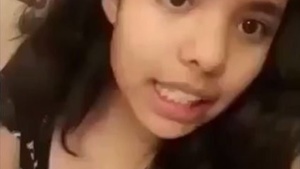 Adorable teen with bangs in MMS video