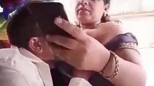 Tailor gives aunty a titjob in steamy video