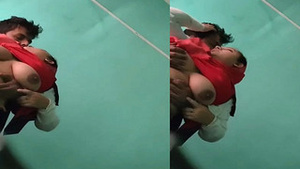 Amateur couple indulges in steamy boob sucking session