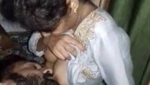 Indian couple shares passionate kissing and boob play in video