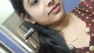 Nude Indian girl fingering herself in the bathroom