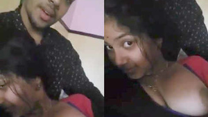 Cute Indian lover reveals his girlfriend's breasts in a steamy video