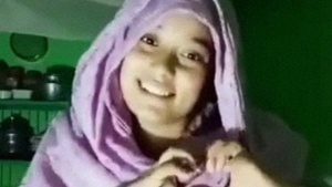 A stunning Bangladeshi teen strips nude for her boyfriend in a steamy video