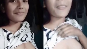 Young college girl flaunts her small breasts