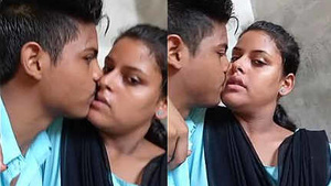 Two young Indian lovers passionately kiss in a steamy video