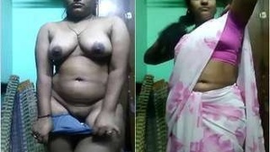 Desi bhabhi strips and exposes her big tits and pussy