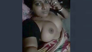 Indian babe Boudi flaunts her boobs and pussy in a hot video