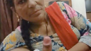 Mature bhabi gives a blowjob and gets fucked in Part 1