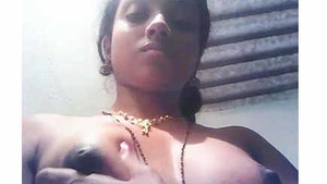 Tamil girl's boobs and nipples get a hard press