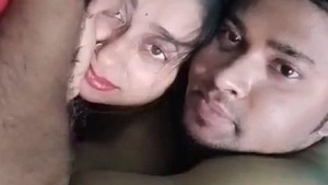 Watch as a stunning Indian woman's tight asshole gets stretched by her friend