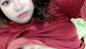 Cute Indian teen flaunts her boobs on webcam in village