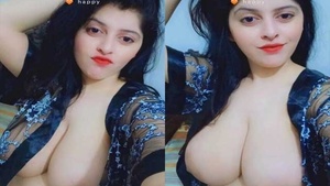 A busty girl showcases her assets in a seductive manner