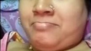 Watch as a sexy bhabhi indulges in a finger play and tastes herself